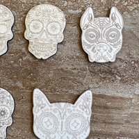 Handmade wooden DIY sugar skull cutout in five unique styles, ready for paint or decorating