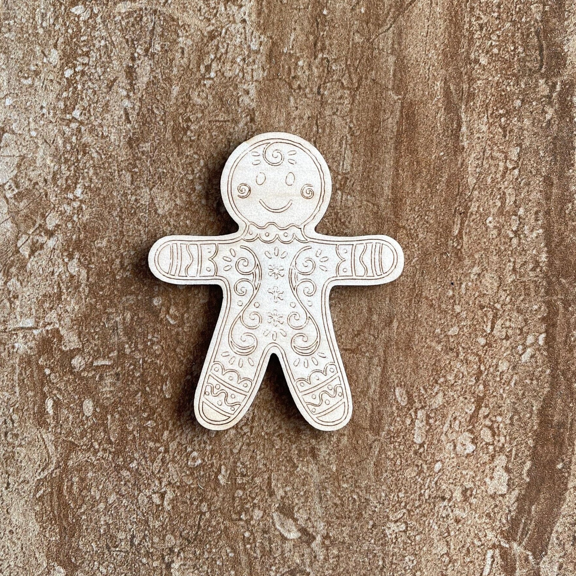 Handmade wooden DIY Gingerbread man cutout ready for paint or decorating