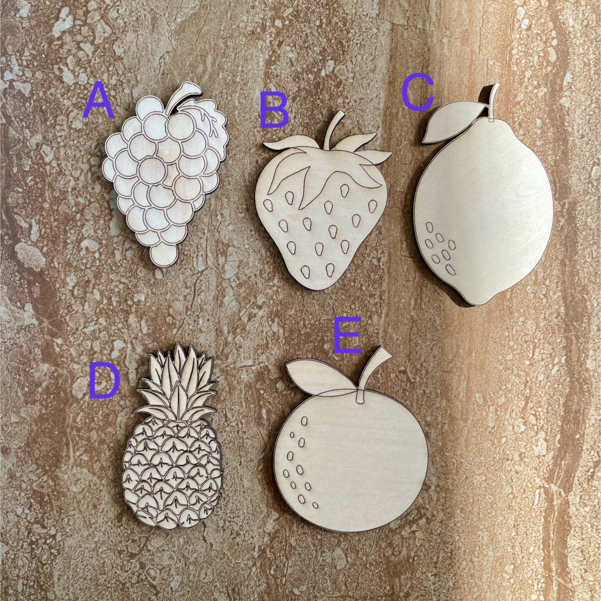 Handmade wooden DIY fruit cutout in five unique styles, ready for paint or decorating
