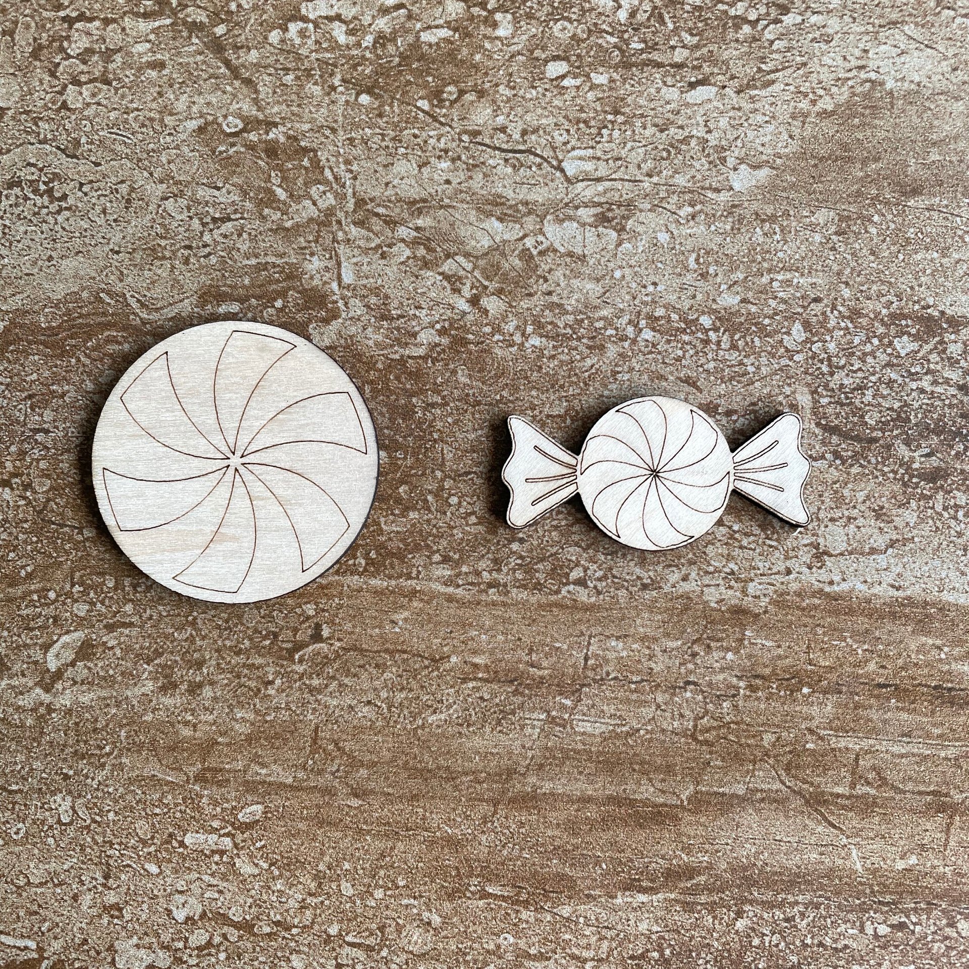 Handmade wooden DIY hard candy disk cutout in two unique styles, ready for paint or decorating