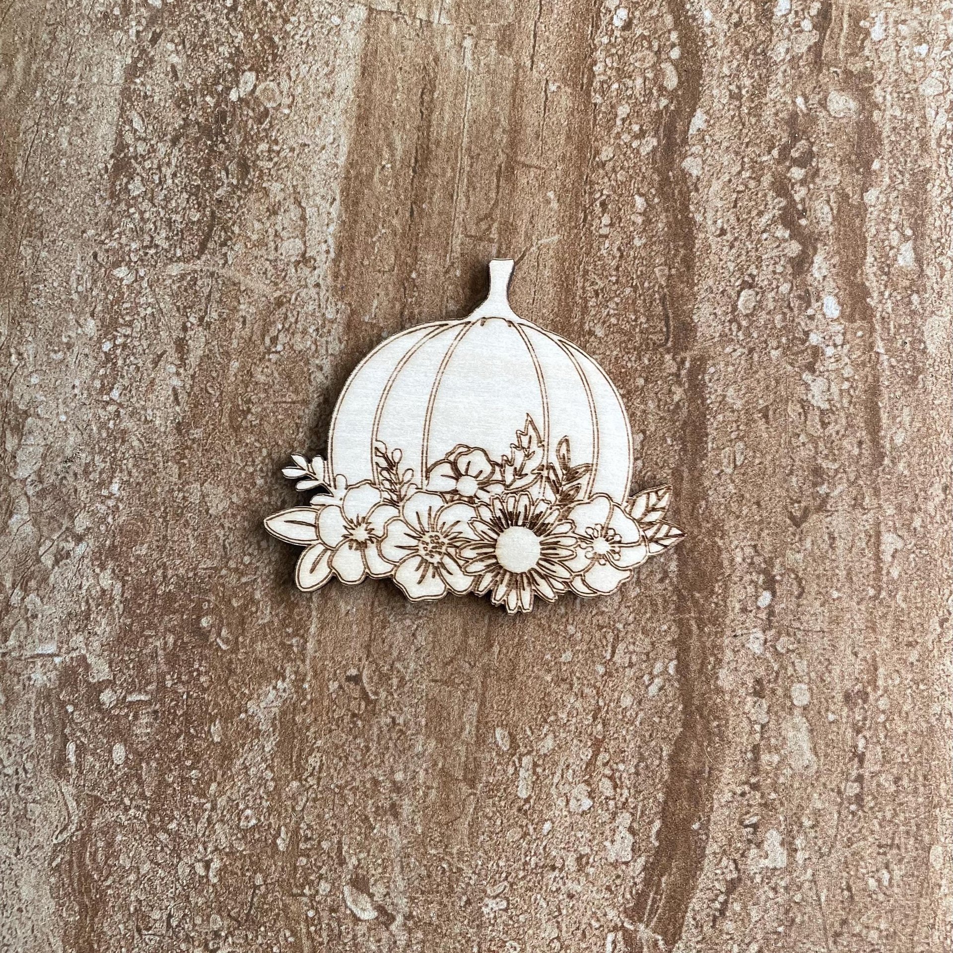 Handmade wooden DIY pumpkin cutout ready for paint or decorating