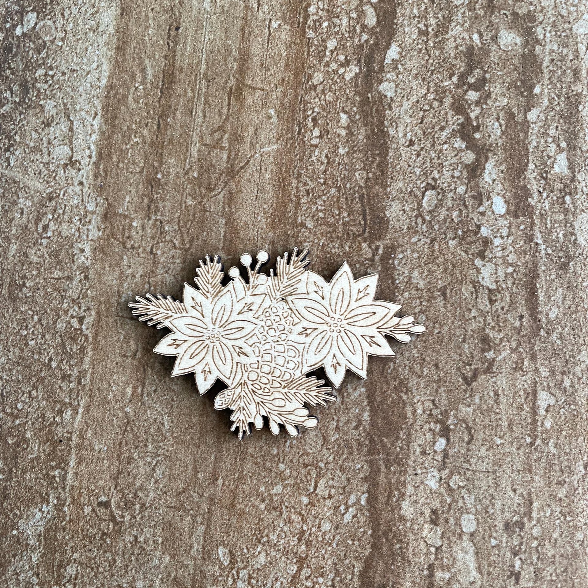 Handmade wooden DIY poinsettia cutout ready for paint or decorating